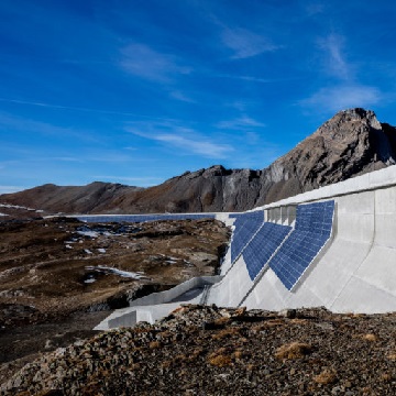 Vertical photovoltaic power stations on alpine dams