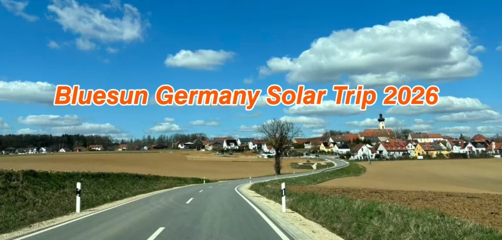 Bluesun Germany Solar Trip 2026 rural landscape with road and European village