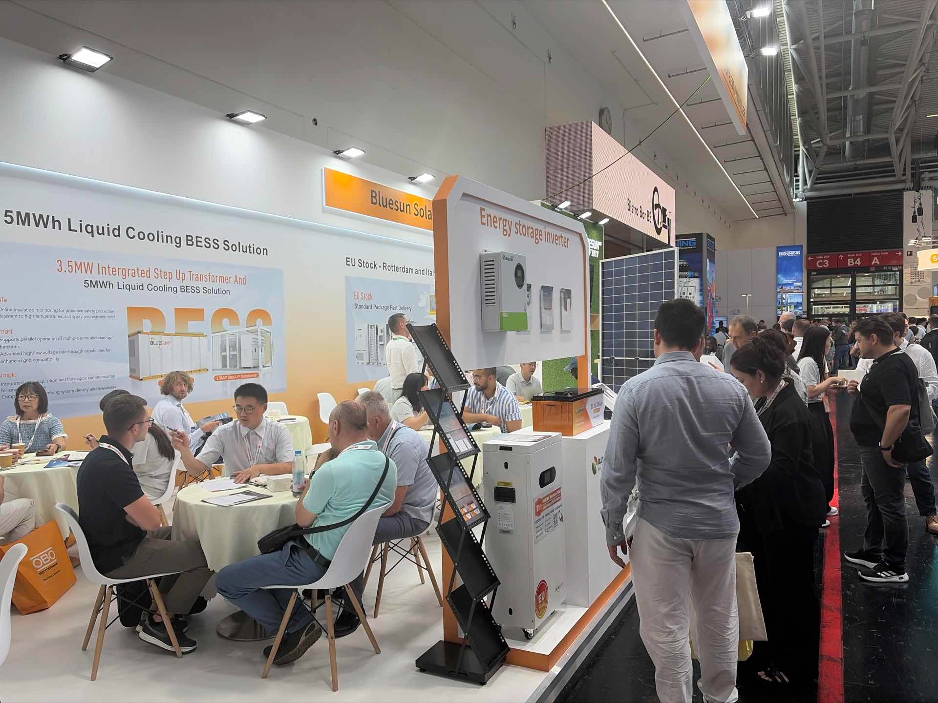 Business discussions at the Bluesun Solar booth during Smarter E Europe 2026
